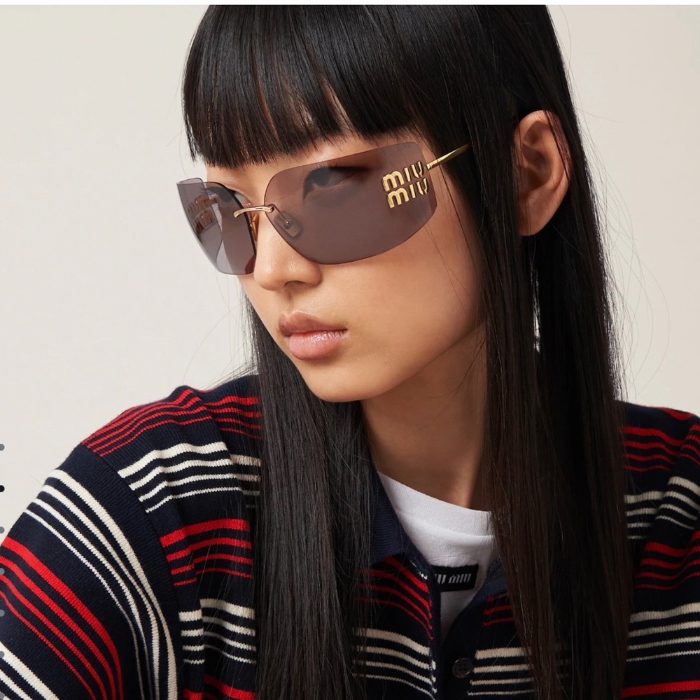 Miu Miu Aube Mauve large Sunglasses